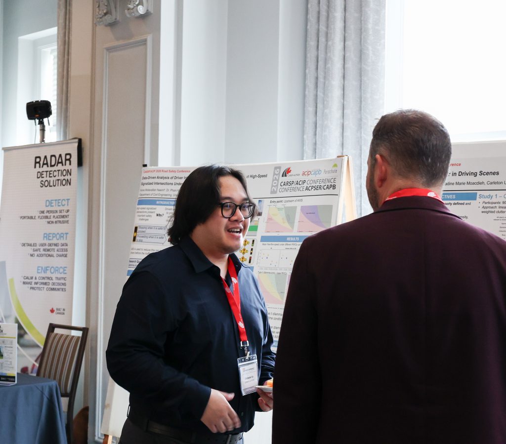 Christopher Du talking about his poster at the CARSP/ACIP 2026 conference.